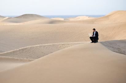 man working alone in the desert