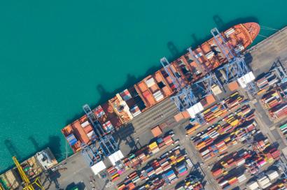 Overhead view of ship at port, re: OSINT for supply chain risk management