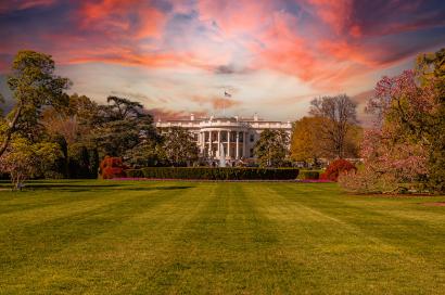 image: The white house in front of a sunset